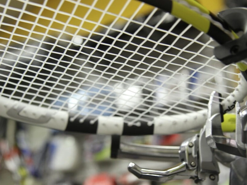 Static Tension Stability in Tennis Strings